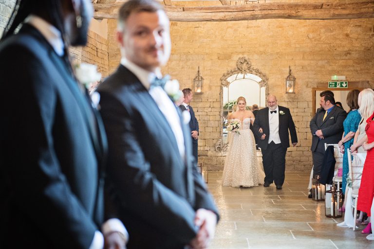 Bride & her father start to walk down the wedding isle. The groom and his best man wait eagerly at Blackwell Grange.