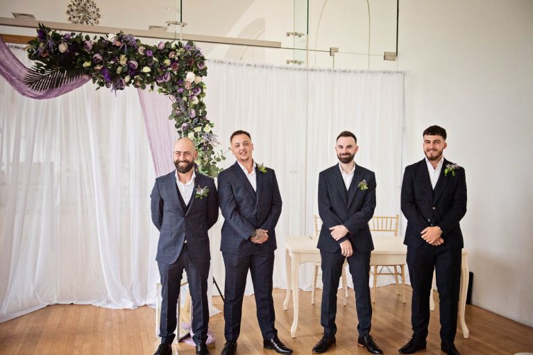 Grooms men waiting at Margam Country Park. Photographed by Blooming Photography
