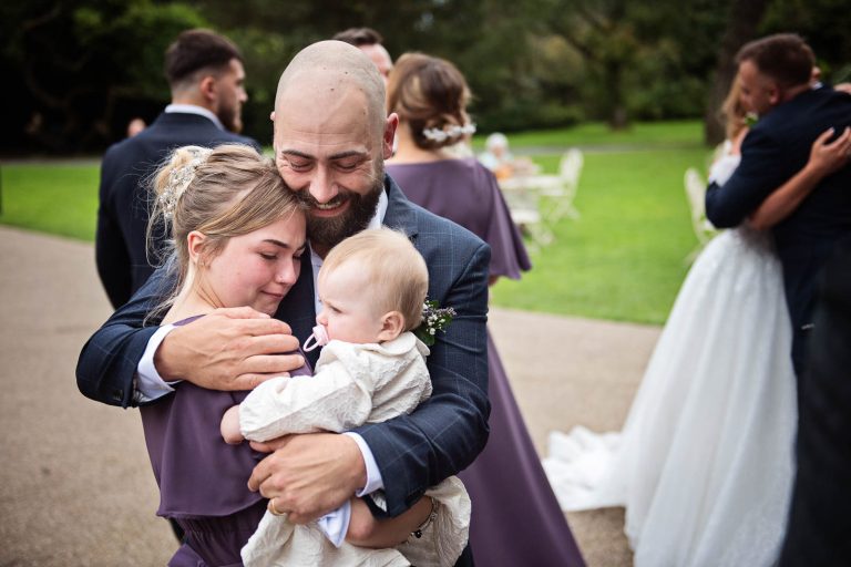 Emotional photo taken at a wedding at Margam Country Park by Blooming Photography.