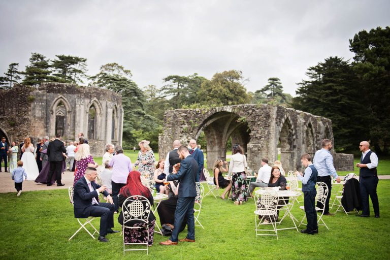 Relaxed wide open photo taken at a wedding at Margam Country Park by Blooming Photography.