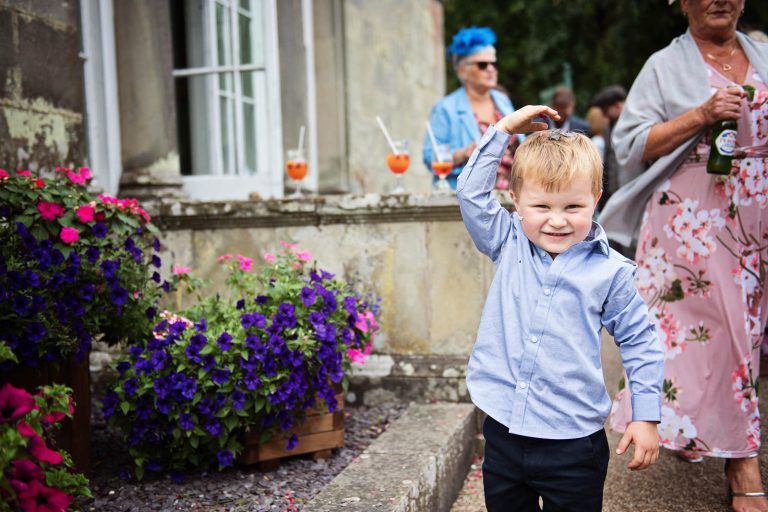 Candid photo taken at a wedding at Margam Country Park by Blooming Photography.