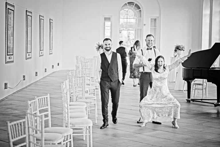Candid image taken of the guests having fun at Margam Country Park, during the wedding breakfast by Blooming Photography.