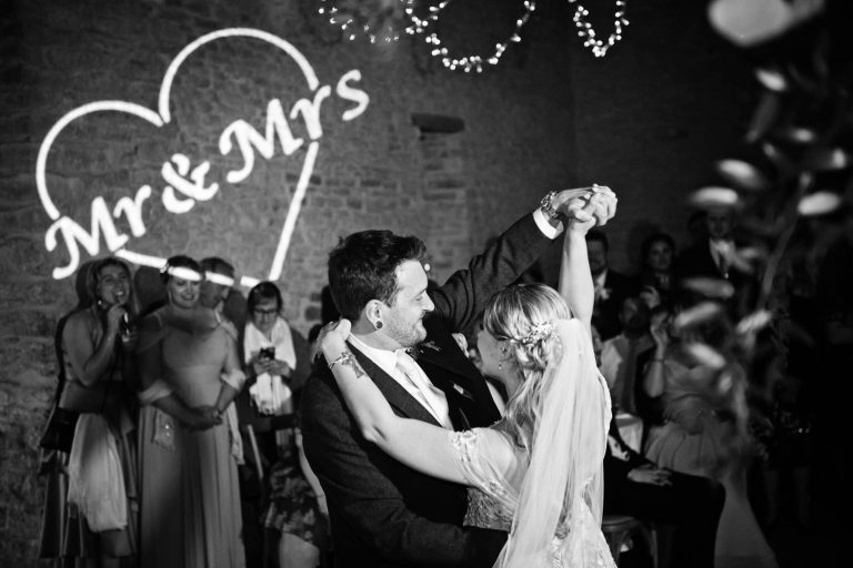 Bride and groom during first dance at Kingscote Barn
