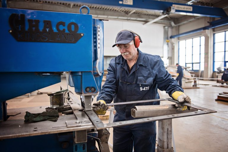 A worker creating an expansion joint in a manufacturing factory in Romania.