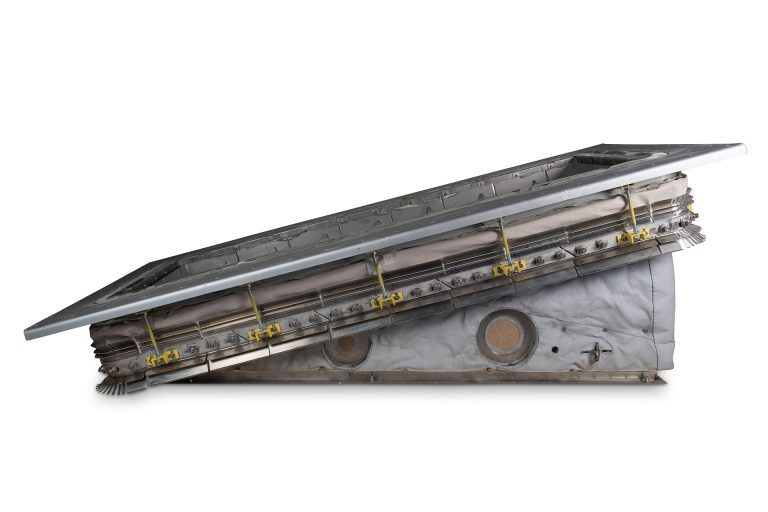 Side product photograph of a engineering expansion joint shot on a white background.