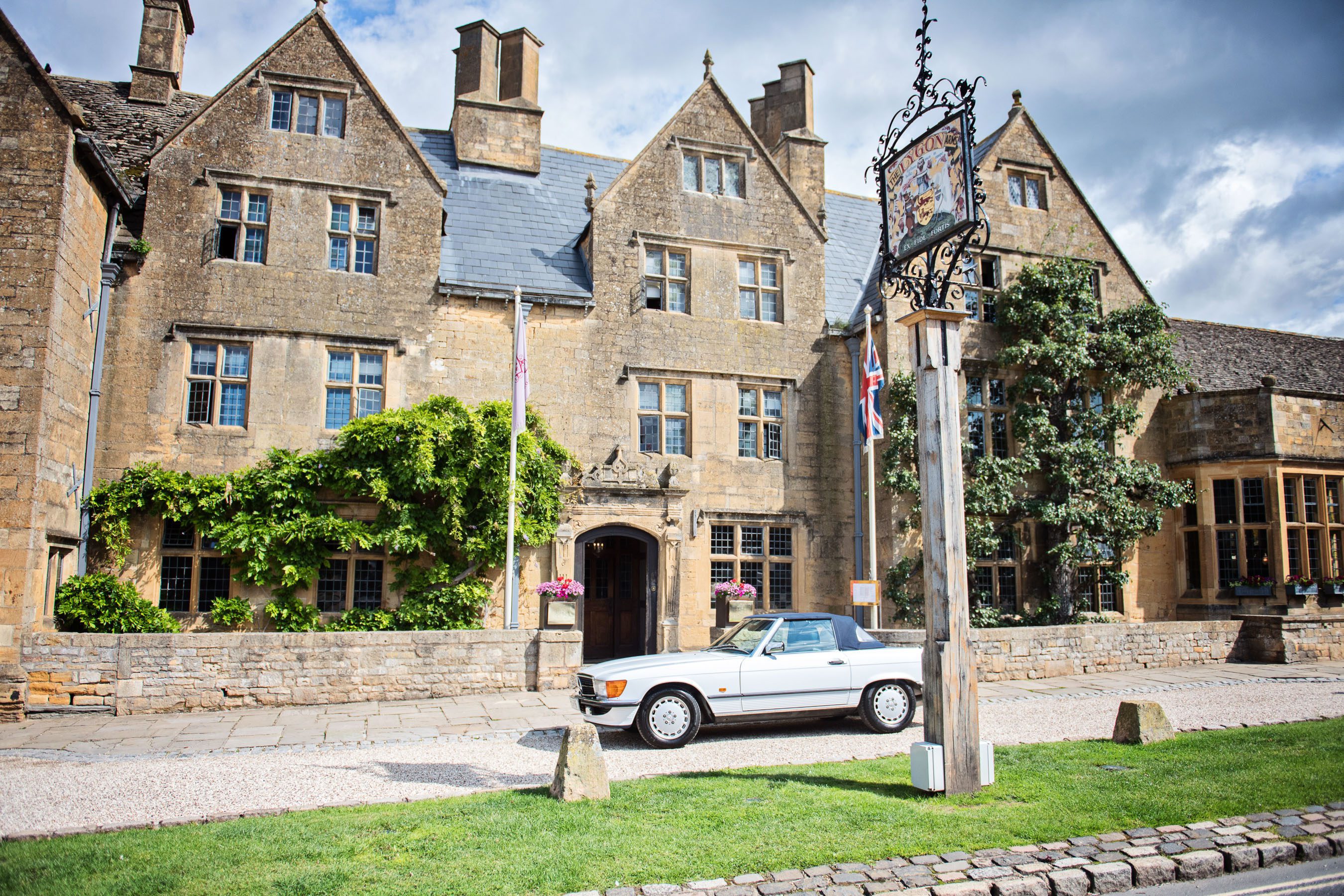 Hindu ceremony exterior set up in the gardens on a sunny day.