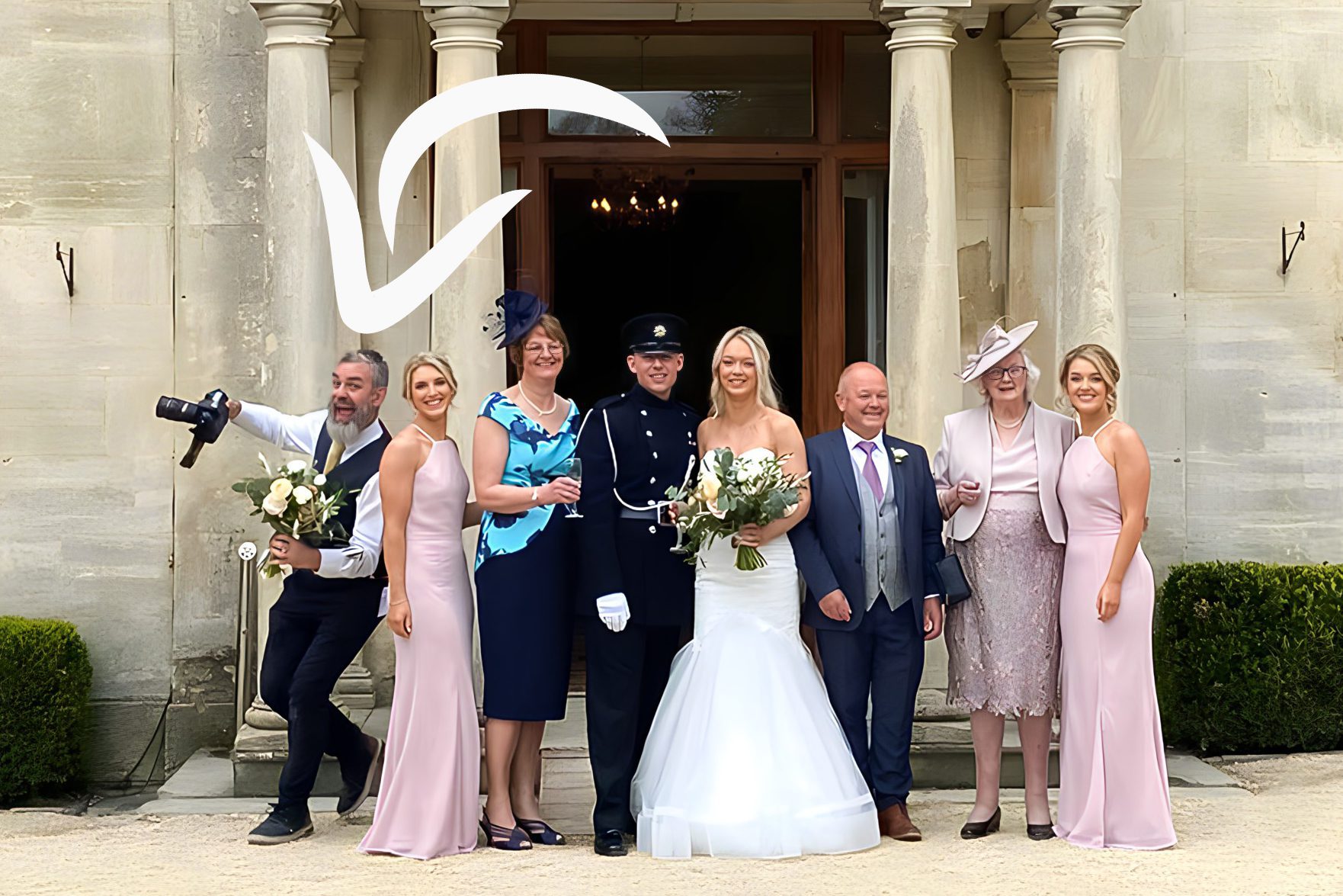 Ben Roberts of Blooming Photography running with a bouquet of flowers.